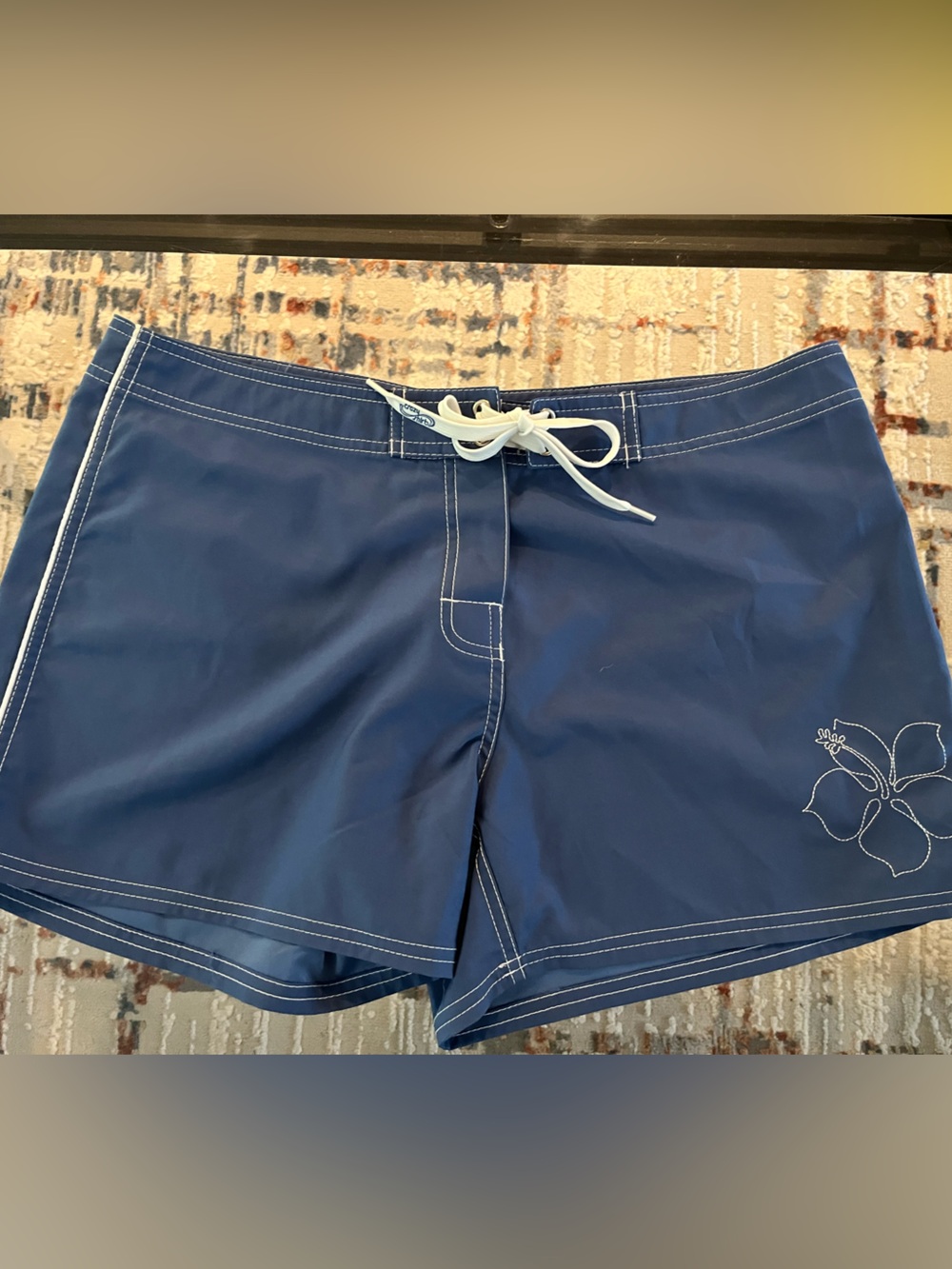Blue hydro color changing Women’s Athletic Swim Shorts with Floral Accent